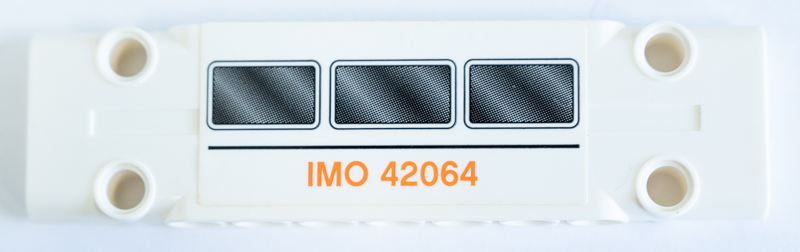 Part 15458pb035 - Technic, Panel Plate 3 x 11 x 1 with Three Black Windows and Orange 'IMO 42064' Pattern (Sticker) - Set 42064 - De BrickPlaats