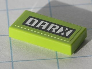 Part 3069pb0119 - Tile 1 x 2 with Black and White 'DARX' Pattern (Sticker) - Set 8119 - De BrickPlaats