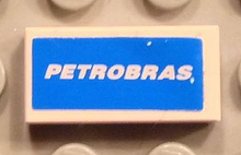 Part 3069pb0261 - Tile 1 x 2 with White 'PETROBRAS' Pattern (Sticker) - Set 8374 - De BrickPlaats