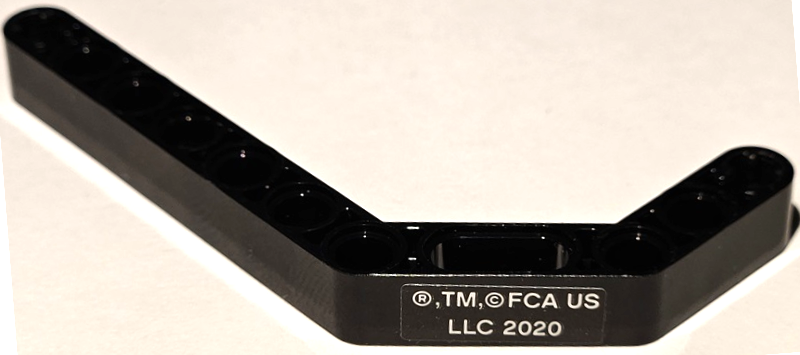 Part 32009pb042 - Technic, Liftarm, Modified Bent Thick 1 x 11.5 Double with '®,TM,© FCA US LLC 2020' Pattern (Sticker) - Set 42111 - De BrickPlaats