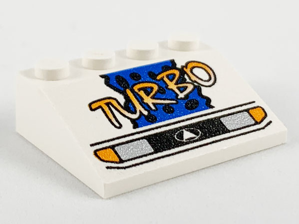 Part 3297px9 - Slope 33 3 x 4 with Headlights, Yellow Turbo, Blue Background and Black Spots Pattern - De BrickPlaats