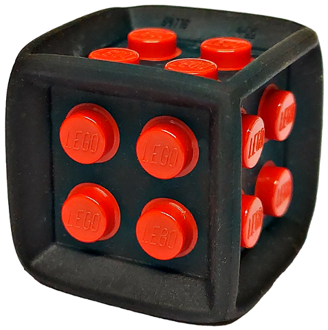 Part 64776pb01 - Die Cube with Flexible Rubber Frame and Molded Hard Plastic Red 2 x 2 Studs Pattern on All Sides - De BrickPlaats